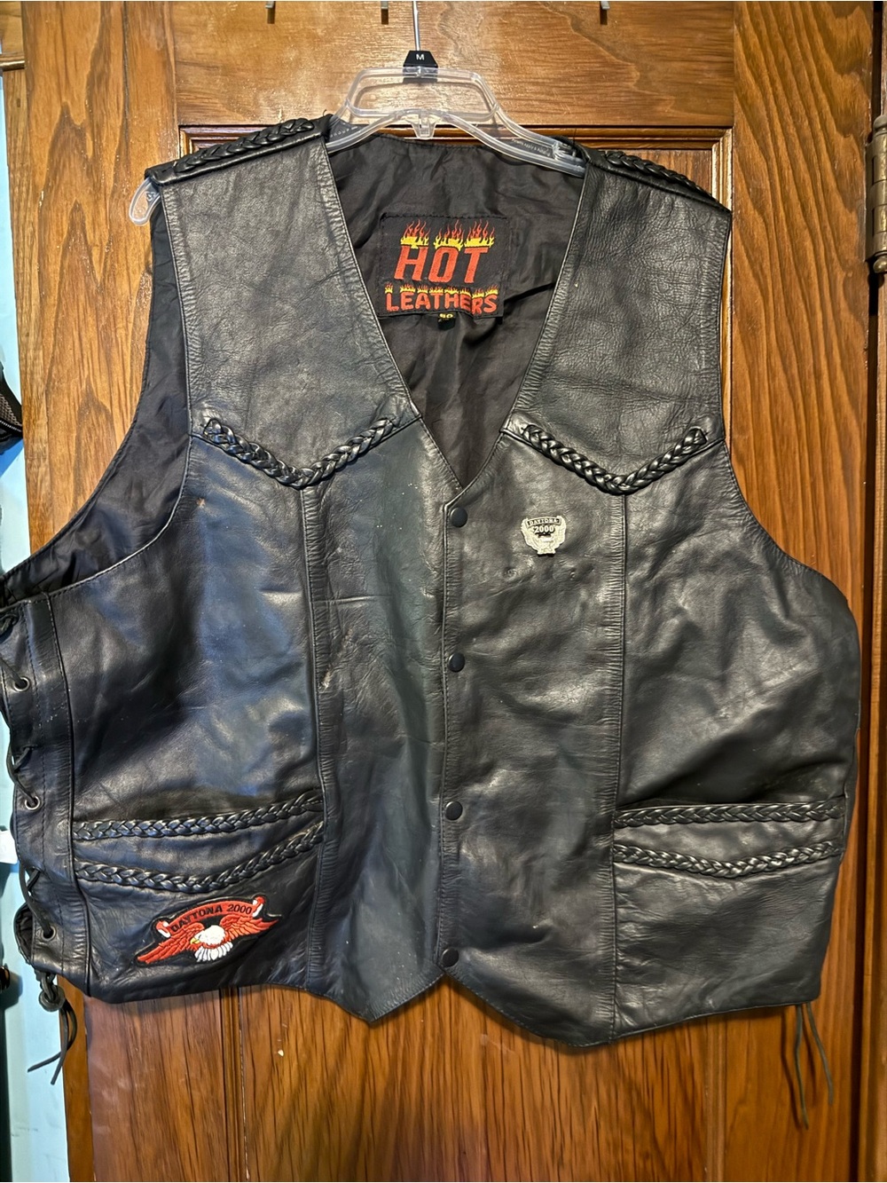 HOT LEATHERS Men’s Black Leather Biker Vest with Braided Trim and design on back